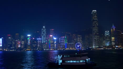 iluminada-de-noche-famoso-de-la-ciudad-Bahía-de-hong-kong-china-panorama-4k