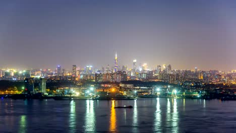 Lapso-de-tiempo-del-horizonte-de-río-Yangtsé-en-la-ciudad-de-nanjing,-china,-de-día-a-noche