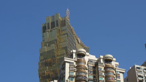 china-day-time-macau-city-famous-hotel-blue-sky-car-window-panorama-4k