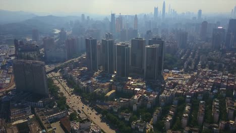 China-shenzhen-ciudad-día-soleado-tráfico-calle-aérea-panorama-4k