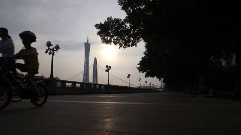 sunset-guangzhou-bridge-canton-tower-riverside-traffic-bay-slow-motion-panorama-4k-china