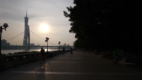 sunset-guangzhou-bridge-canton-tower-riverside-traffic-bay-slow-motion-panorama-4k-china