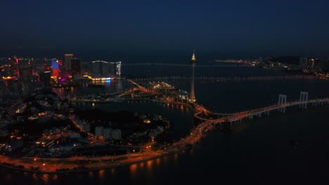 night-illuminated-zhuhai-city-macau-cityscape-aerial-panorama-4k-china