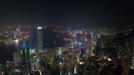 noche-iluminación-famoso-hong-kong-ciudad-Bahía-panorama-aéreo-4k-china