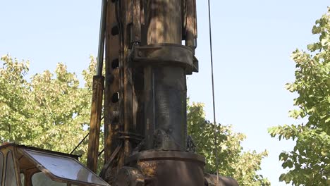 Construction-drill-auger-working-in-the-countryside