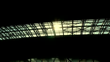 the-sun-shines-through-the-roof-of-the-airport-pavilion