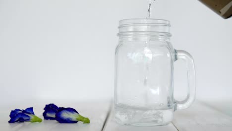 Step-of-doing-a-butterfly-pea-flower-water-soaked-drink-,-herbal-infused-water-to-healthy-detox