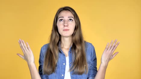 Pretty-Woman-with-Frustration-and-Anger-Isolated-on-Yellow-Background