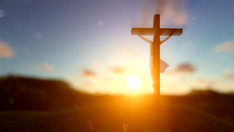 Jesus-on-cross-over-blurry-sunset,-concept-for-religion