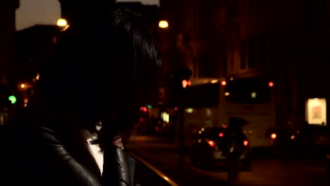 Sad-depressed-Chinese-woman's-profile-alone-in-the-street-at-night