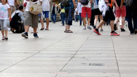 Foot-crowd-of-people-walking-on-megacity