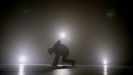 Famous-singer-performing-hip-hop-dance-style-on-the-stage-with-smoke