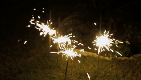 Bengal-fire-burns-on-the-ground-with-bright-sparks