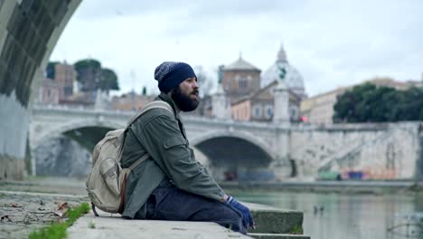 Homeless-Man-Smoking-A-Cigarette-near-the-river