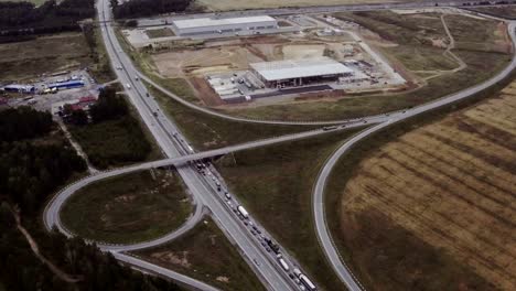 Aerial-footage-of-building-new-large-warehouse