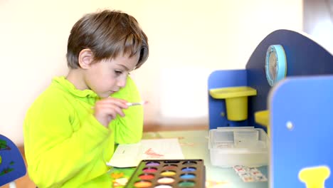 Kid-Painting-at-Kindergarten