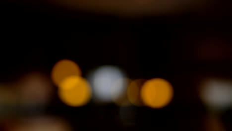 blurred-night-city-life,-car-lights-at-night,-colorful-bokeh,-abstract-background