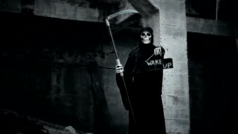 death-with-a-scythe-raises-a-sign-with-the-inscription-wake-up