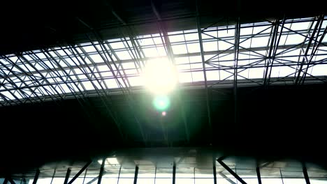 the-sun-shines-through-the-roof-of-the-airport-pavilion