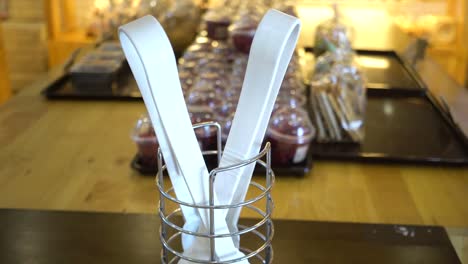 Close-up-of-bakery-store-shop-with-freshly-baked-breads-on-shelf