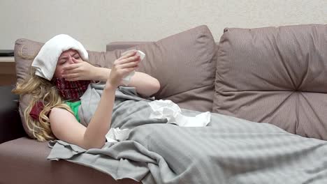 Teenage-girl-blows-her-nose-in-a-paper-handkerchief.-She-has-a-cold