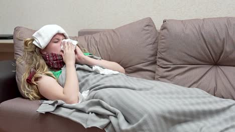 Teenage-girl-blows-her-nose-in-a-paper-handkerchief.-She-has-a-cold