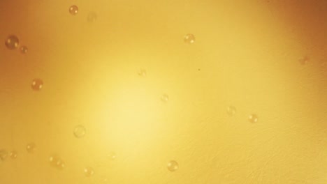 soap-bubbles-gold-background-hd-footage