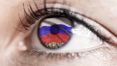 woman-green-eye-in-close-up-with-the-flag-of-Russia-in-iris-with-wind-motion.-video-concept