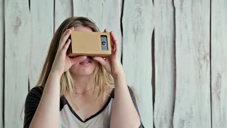 Young-woman-with-long-hair-using-Virtual-Reality-Glasses