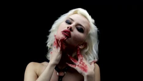 Fashion-blonde-with-bloody-hands-and-face