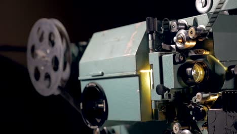 Old-mechanical-film-projector-working