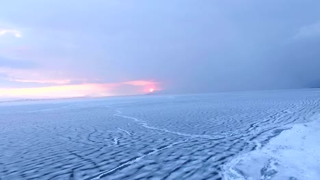 Flying-over-iced-sea-or-ocean-by-helicopter-.