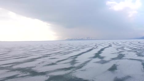 Flying-over-iced-sea-or-ocean-by-helicopter-.