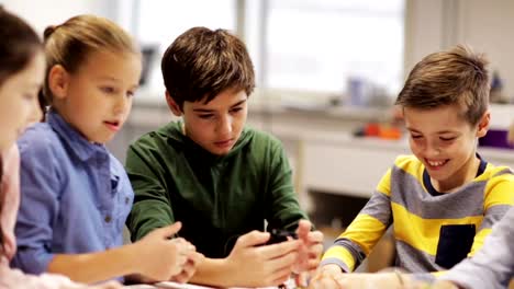 happy-children-learning-at-robotics-school