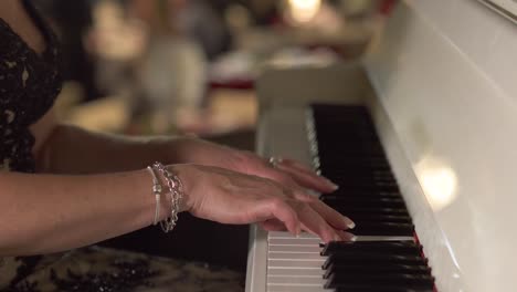 Adult-woman-plays-piano