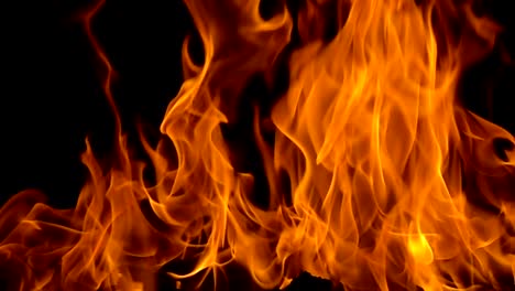 Flames-of-fire-on-black-background-in-slow-motion