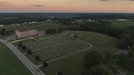 Slow-Forward-Aerial-Establishing-Shot-of-Pennsylvania-Church-at-Sunset