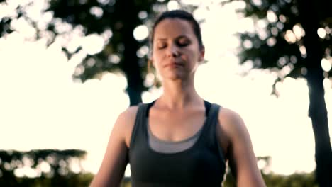 Slender-fit-girl-doing-yoga-on-exercise-mat