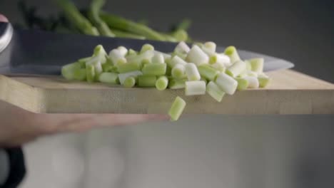 Falling-of-green-onion.-Slow-motion-480-fps