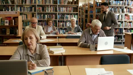 Man-Teaching-Group-of-Retired-People