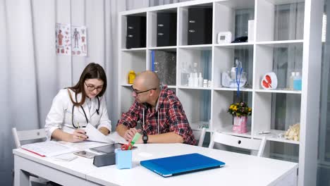 The-man-on-reception-at-the-doctor-at-the-clinic.