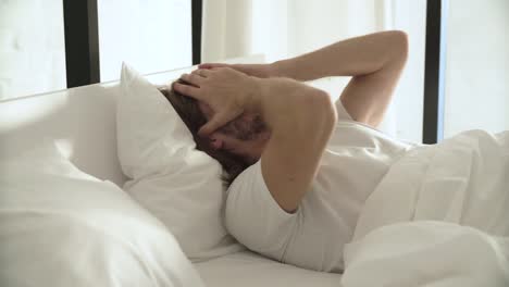 Wake-Up.-Man-Sleeping-In-Bed-With-Phone-Alarm