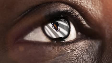 Woman-black-eye-in-close-up-with-the-flag-of-Massachusetts-state-in-iris,-united-states-of-america-with-wind-motion.-video-concept