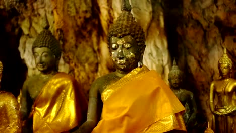 Gold-Buddha-statues-at-Tiger-Cave-Temple-Wat-Tham-Sua-,-Kanchanaburi-Province,-Thailand