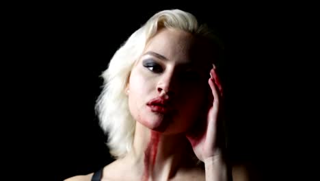 Fashion-blonde-with-bloody-hands-and-face