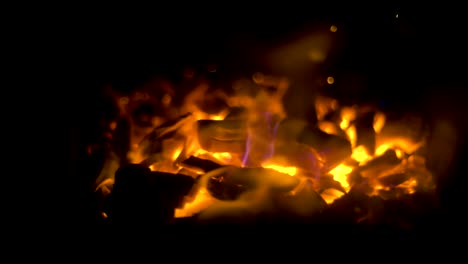 Flying-glowing-bonfire-embers-into-the-dark