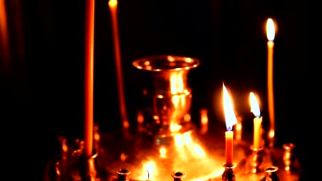 Candle-holder-with-burning-candlesticks-in-the-Christian-Orthodox-Church