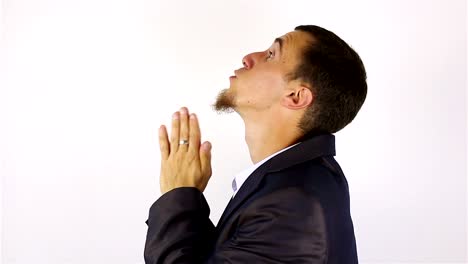 Young-bearded-man-praying,-asking-God-for-help