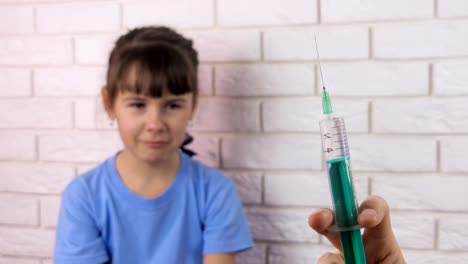 A-child-is-afraid-of-a-syringe.