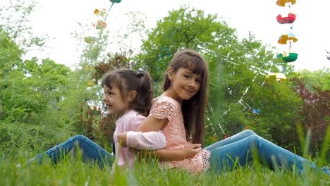 The-children-in-the-park-are-playing-together.